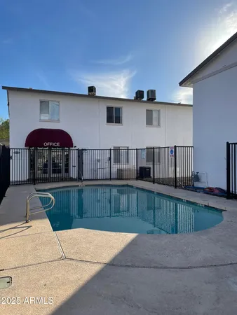 a kitchen with a car parked in it