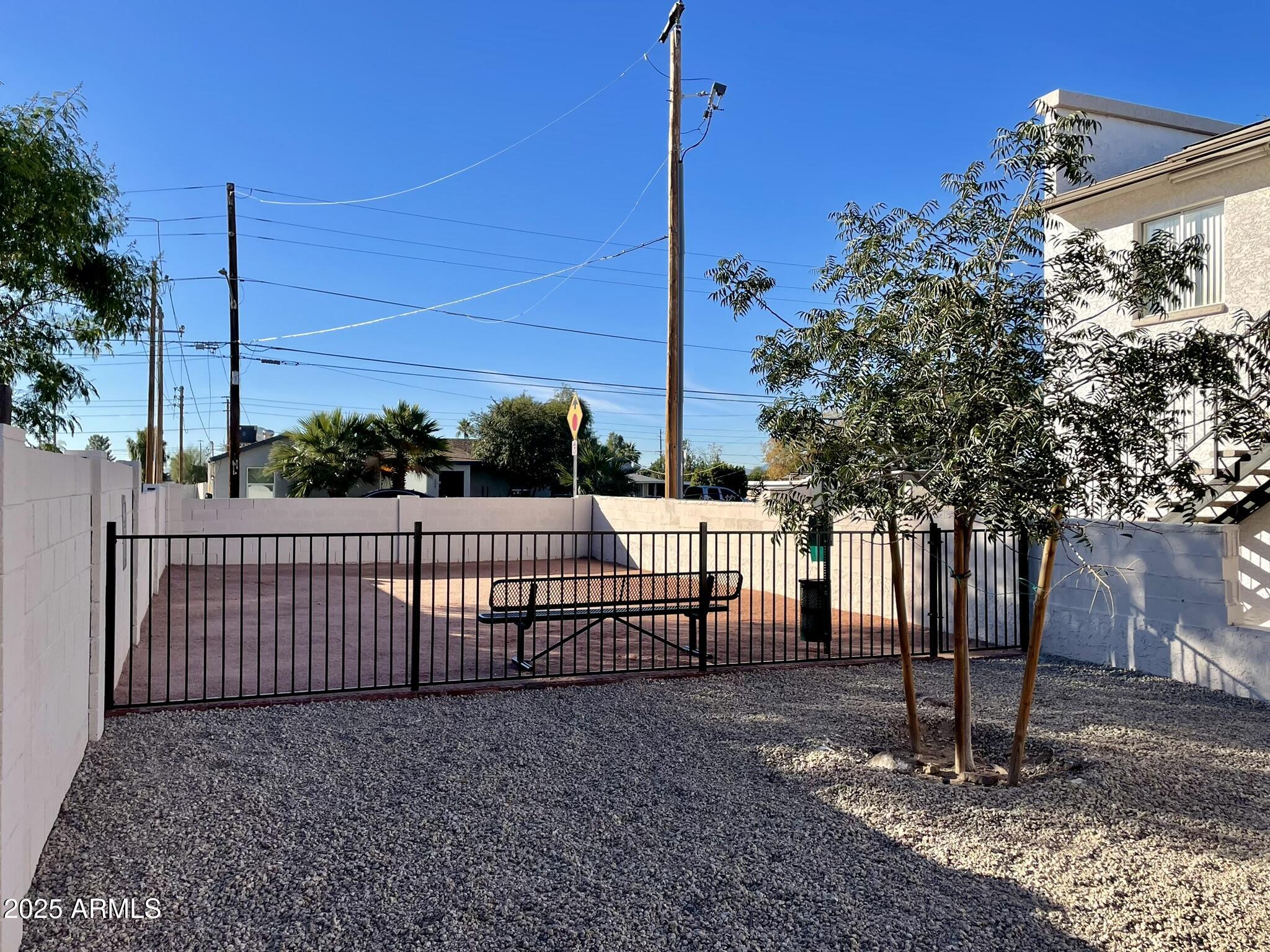 1222 East Mountain View Road, Unit 108 Phoenix, AZ 85020 - Photo 19 of 19 a view of a backyard with tree