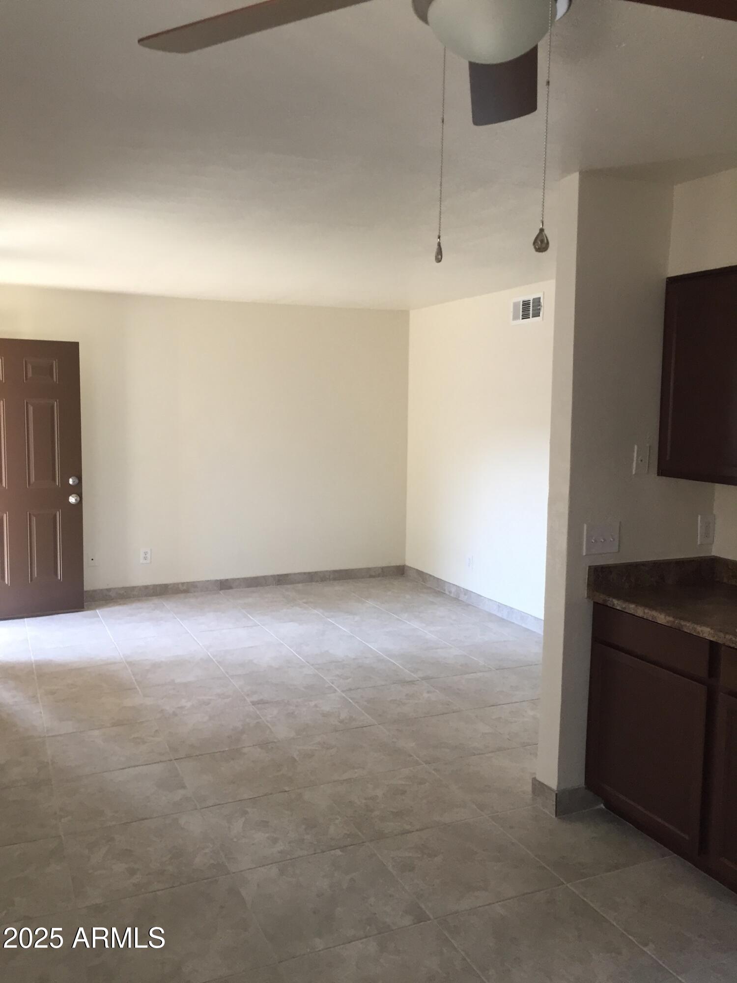 1222 East Mountain View Road, Unit 108 Phoenix, AZ 85020 - Photo 3 of 19 a view of an empty room