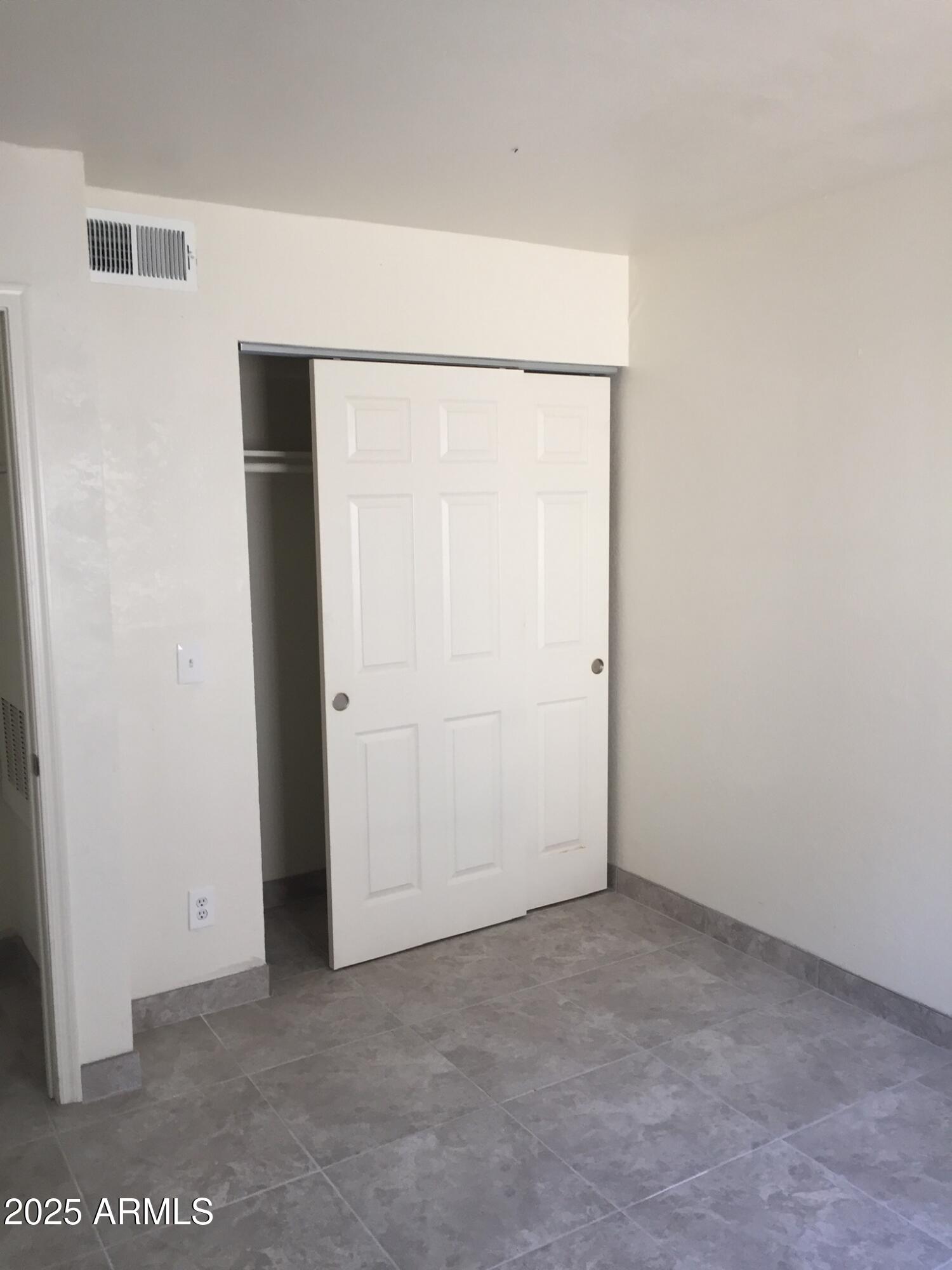 1222 East Mountain View Road, Unit 108 Phoenix, AZ 85020 - Photo 5 of 19 a view of an empty room
