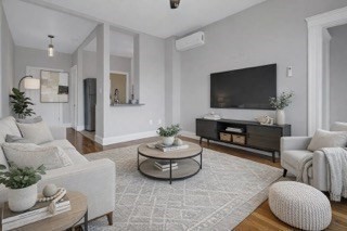 321 Summit Avenue, Unit 301 Boston, MA 02135 - Photo 3 of 6 a living room with furniture and a flat screen tv