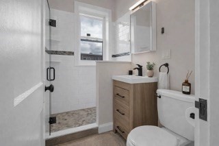 321 Summit Avenue, Unit 301 Boston, MA 02135 - Photo 4 of 6 a bathroom with a sink toilet and shower