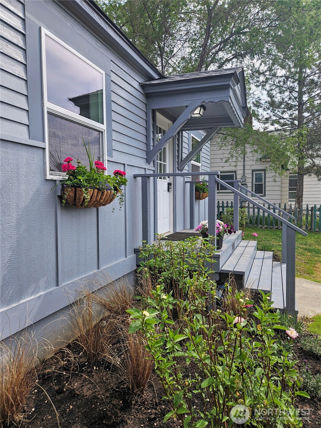 108 West 3rd Street Lind, WA 99341 - Photo 2 of 29 a front view of a house with a yard