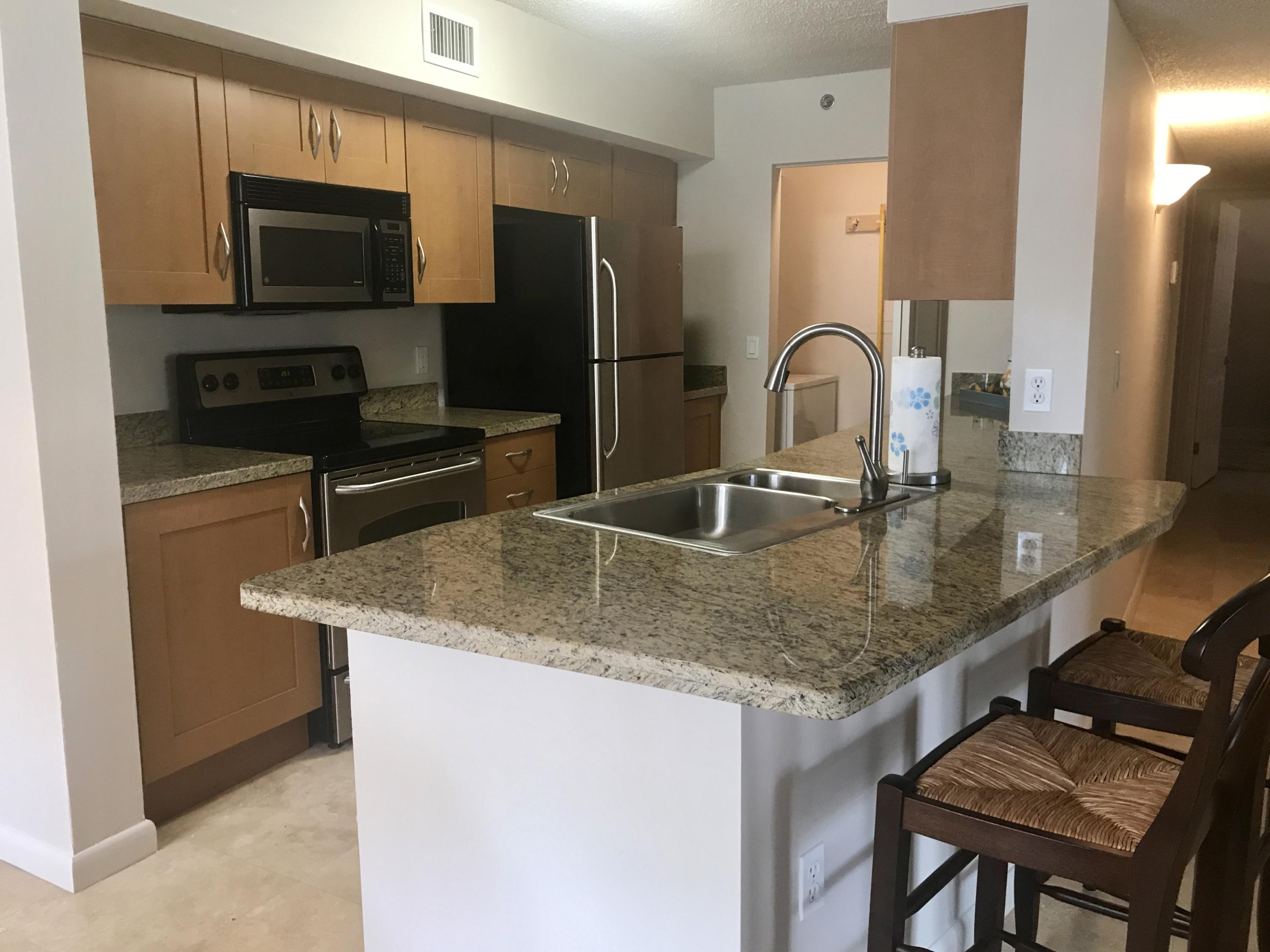 3131 Clint Moore Road, Unit 101 Boca Raton, FL 33496 - Photo 2 of 34 kitchen