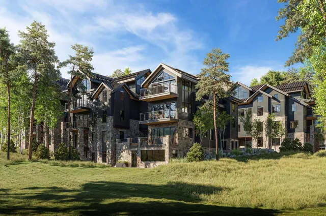 a view of a building with a swimming pool