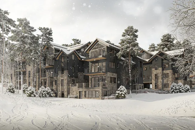 a view of a house with a snow in the yard