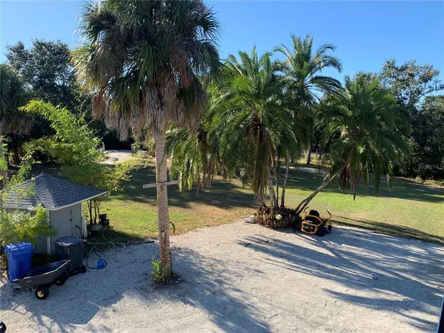 a view of ocean view with large trees