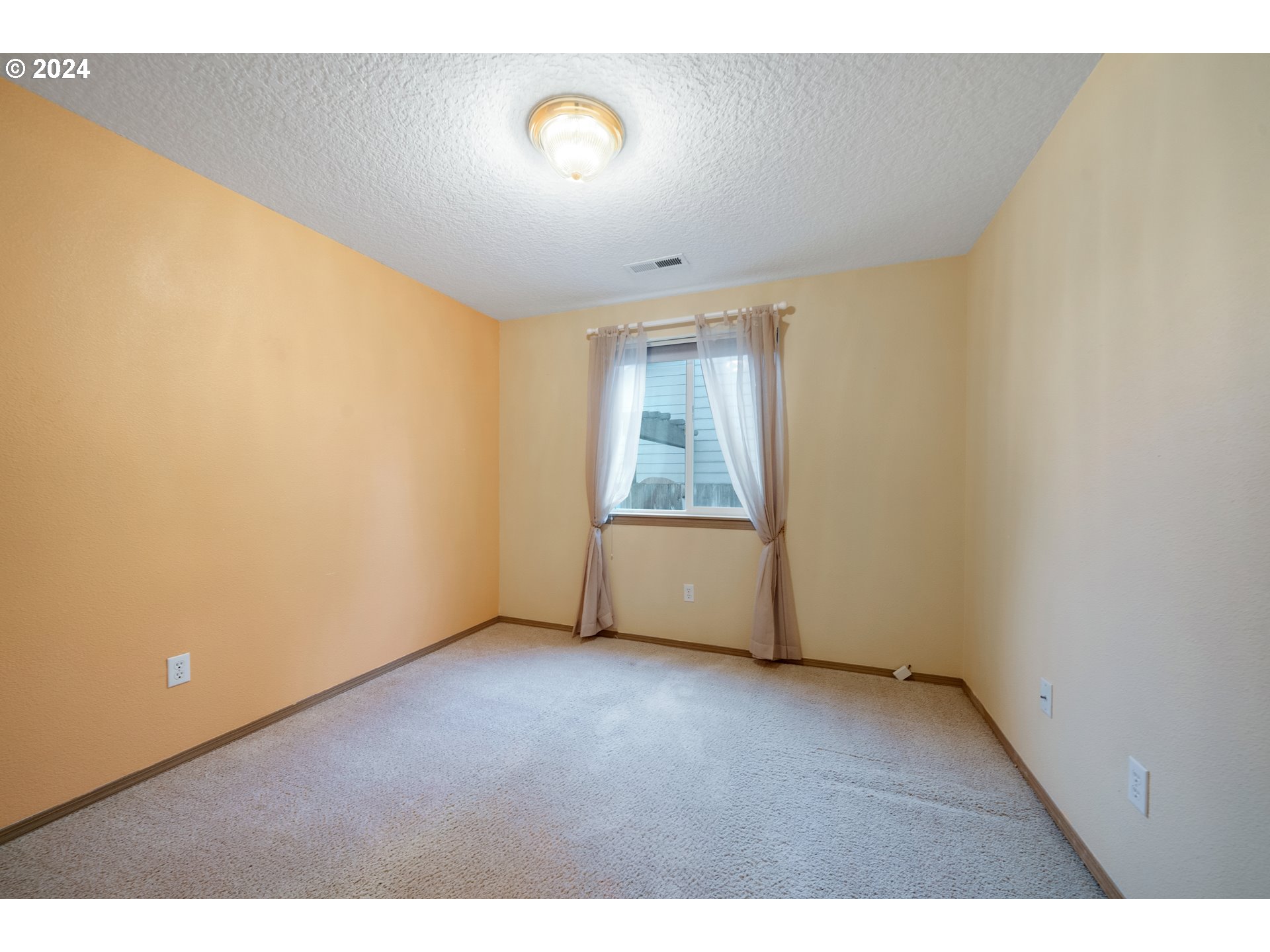 13509 Northeast 77th Street Vancouver, WA 98682 - Photo 20 of 29 a view of an empty room with a window