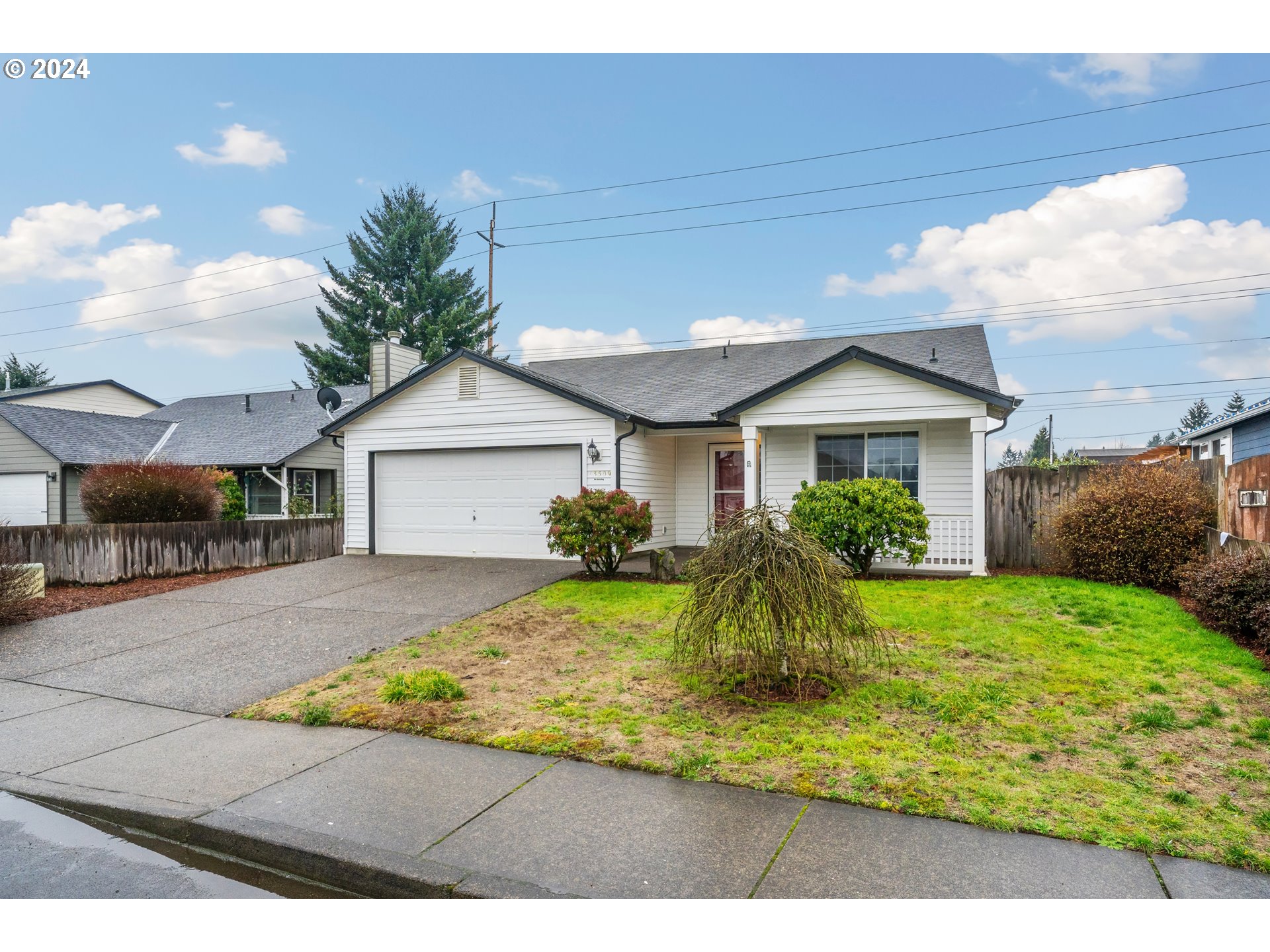 13509 Northeast 77th Street Vancouver, WA 98682 - Photo 2 of 29 a view of a house with backyard and garden