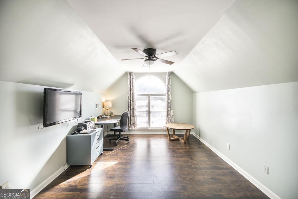128 Springwood Court Macon, GA 31210 - Photo 12 of 22 a view of a livingroom with furniture hardwood floor and a ceiling fan