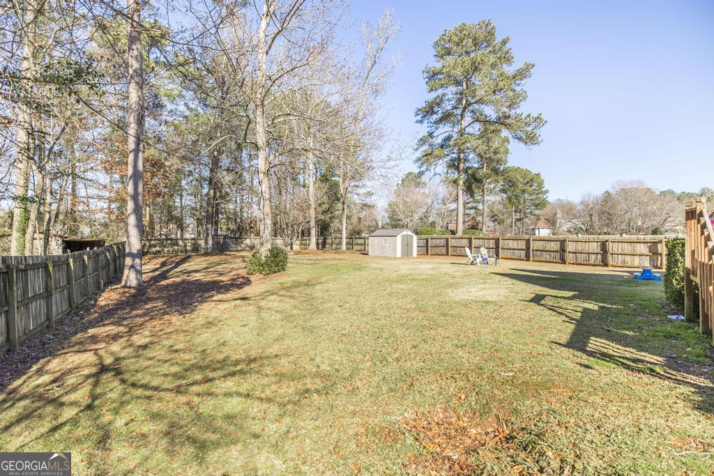 128 Springwood Court Macon, GA 31210 - Photo 21 of 22 a view of yard with trees