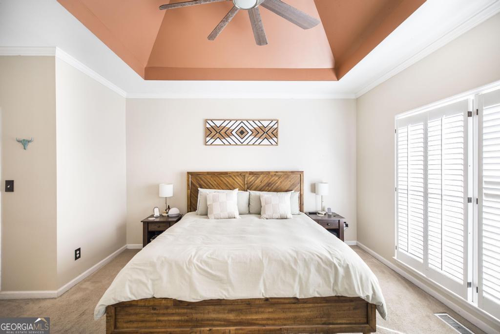 128 Springwood Court Macon, GA 31210 - Photo 8 of 22 a bedroom with a bed and a window