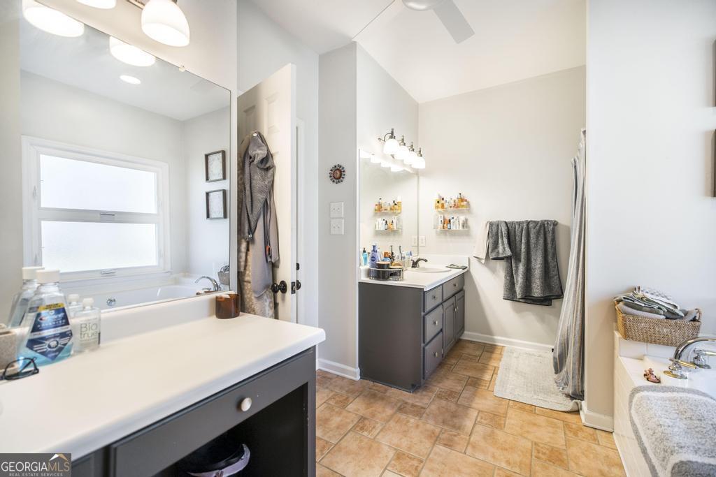 128 Springwood Court Macon, GA 31210 - Photo 10 of 22 a room with a table chairs and refrigerator