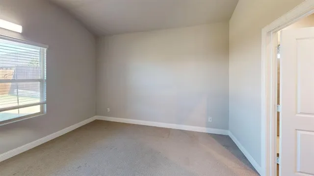an empty room with a window