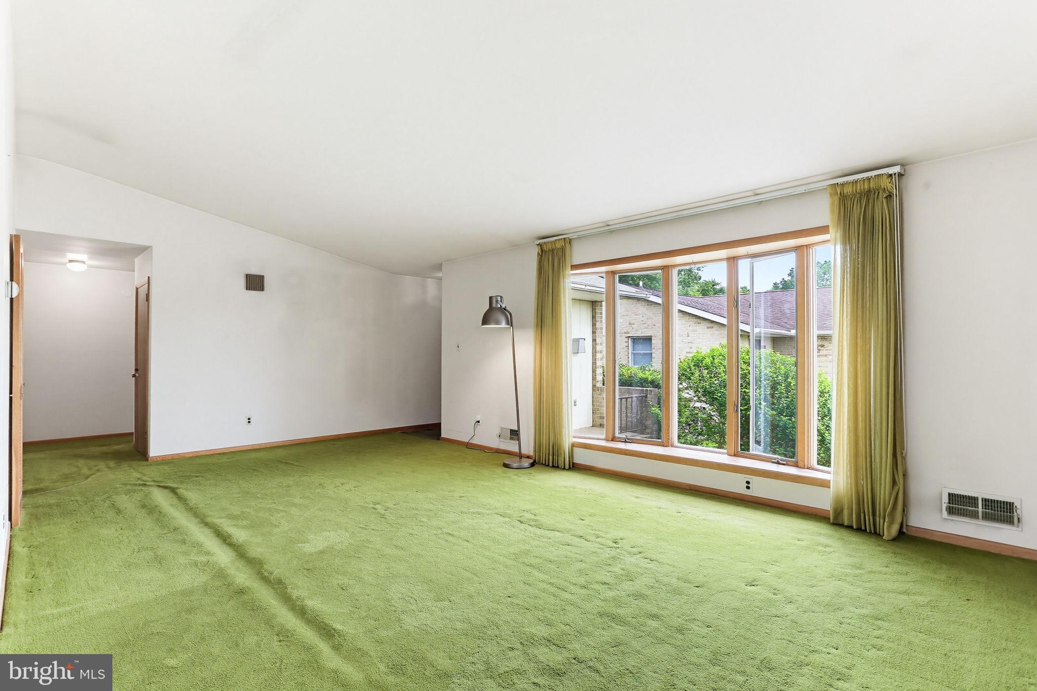 9301 Gardenia Road Baltimore, MD 21236 - Photo 11 of 37 a view of an empty room with a window