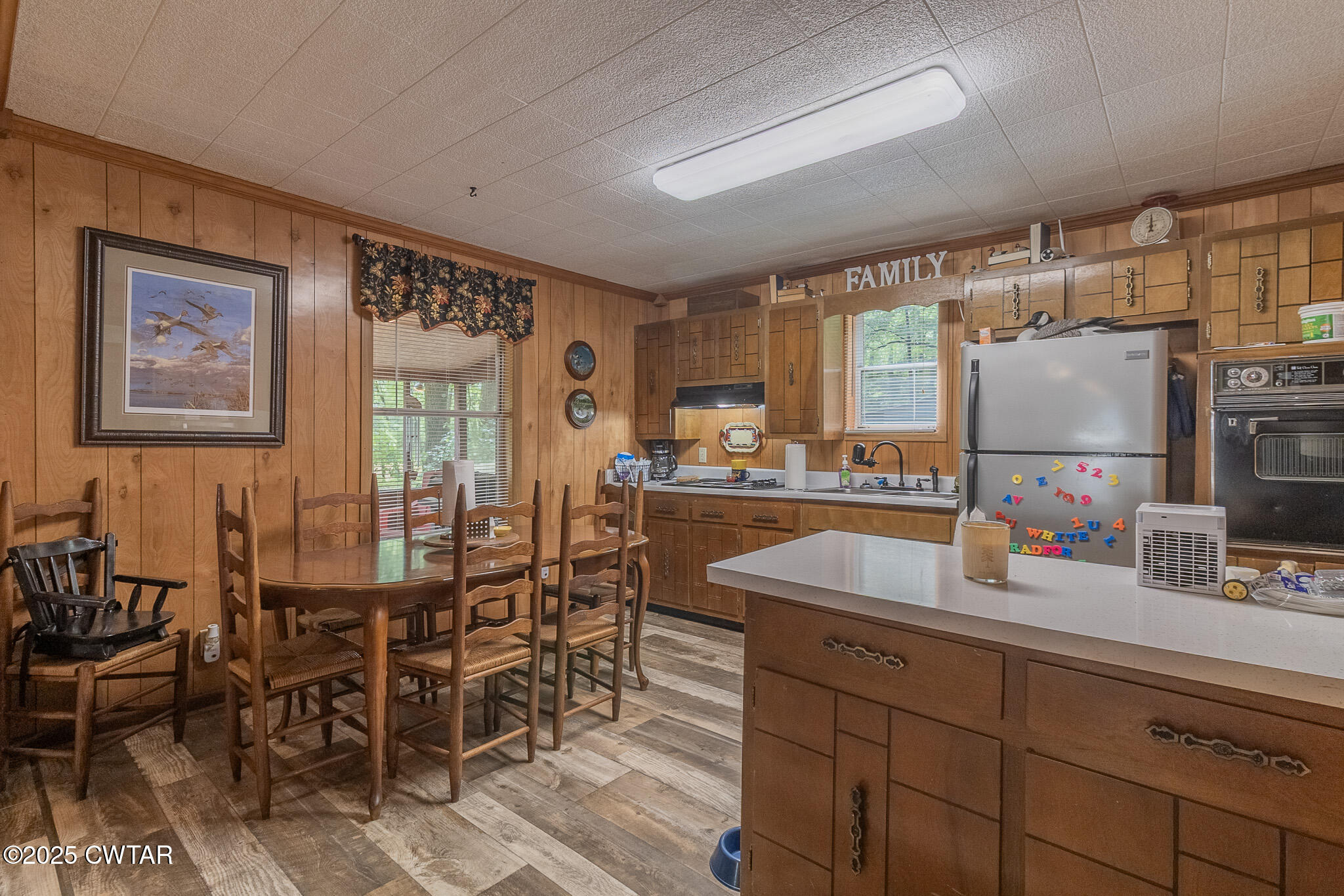 525 Wesley Lake Road Brownsville, TN 38012 - Photo 9 of 21 a kitchen with stainless steel appliances granite countertop a sink and a refrigerator