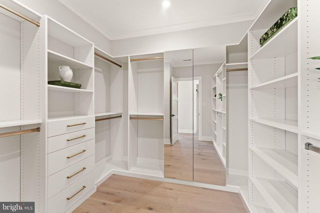 a bathroom with a sink toilet tub and shower