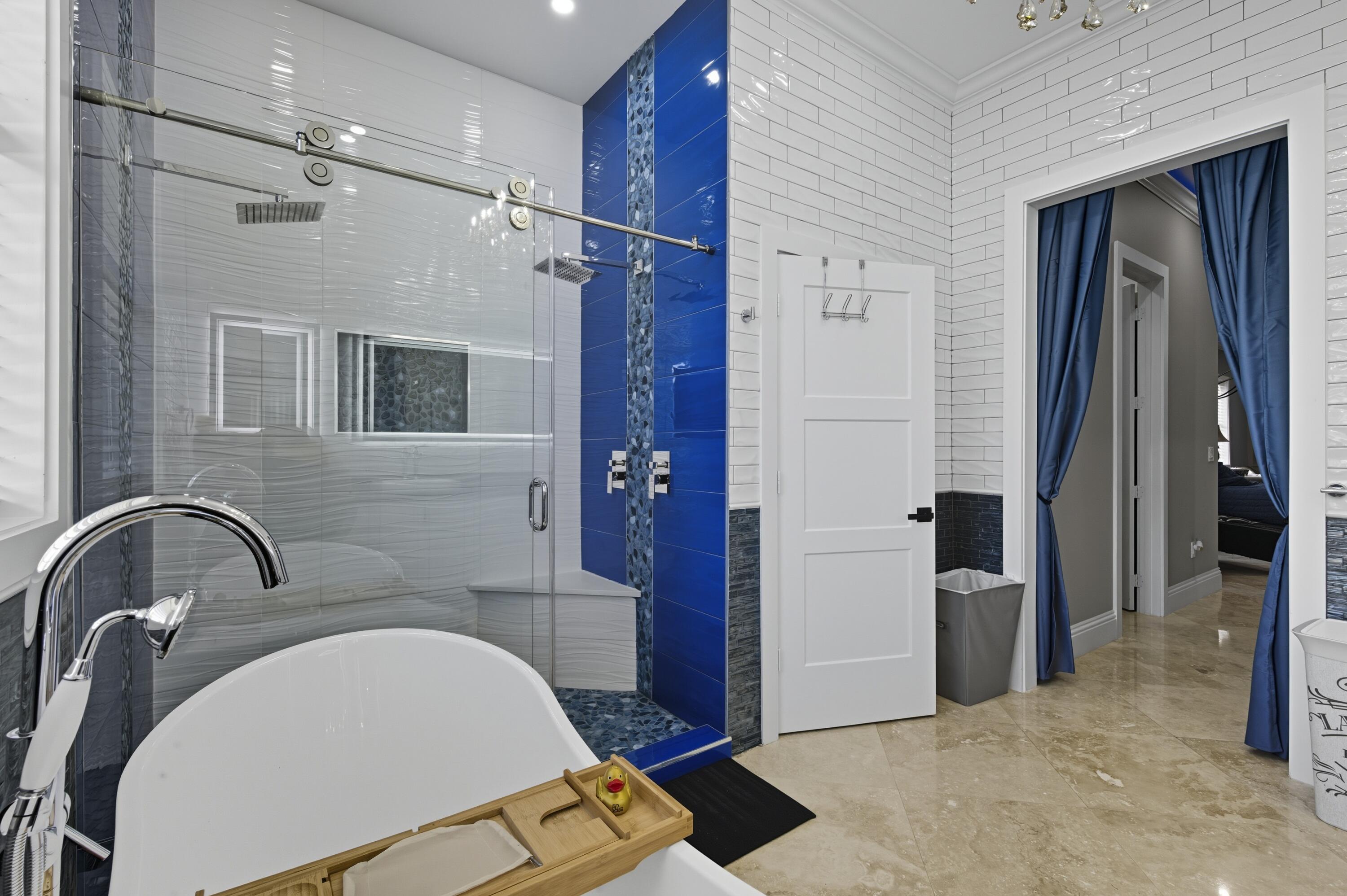 8350 Whispering Oak Way West Palm Beach, FL 33411 - Photo 20 of 51 a bathroom with a sink and a mirror