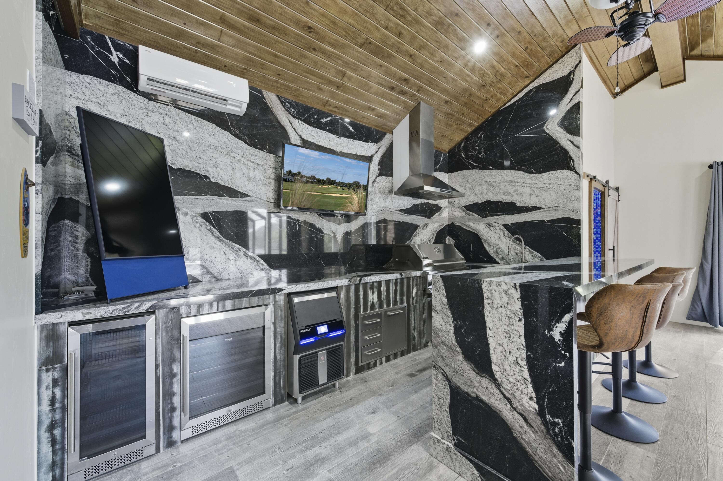 8350 Whispering Oak Way West Palm Beach, FL 33411 - Photo 22 of 51 a view of storage and utility room