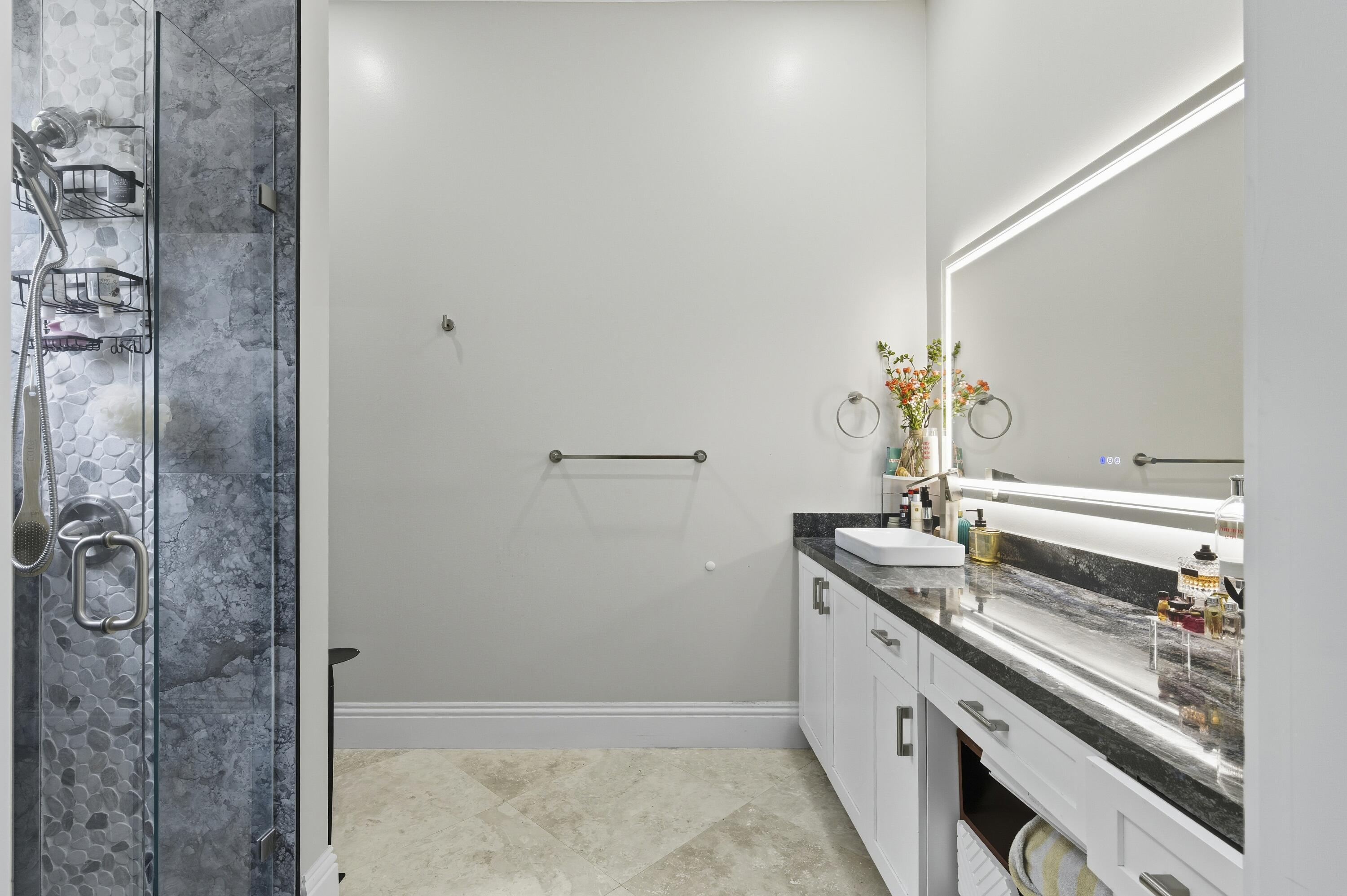 8350 Whispering Oak Way West Palm Beach, FL 33411 - Photo 36 of 51 a kitchen with a sink and refrigerator