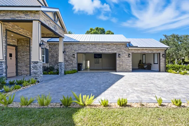 a front view of a house with a porch