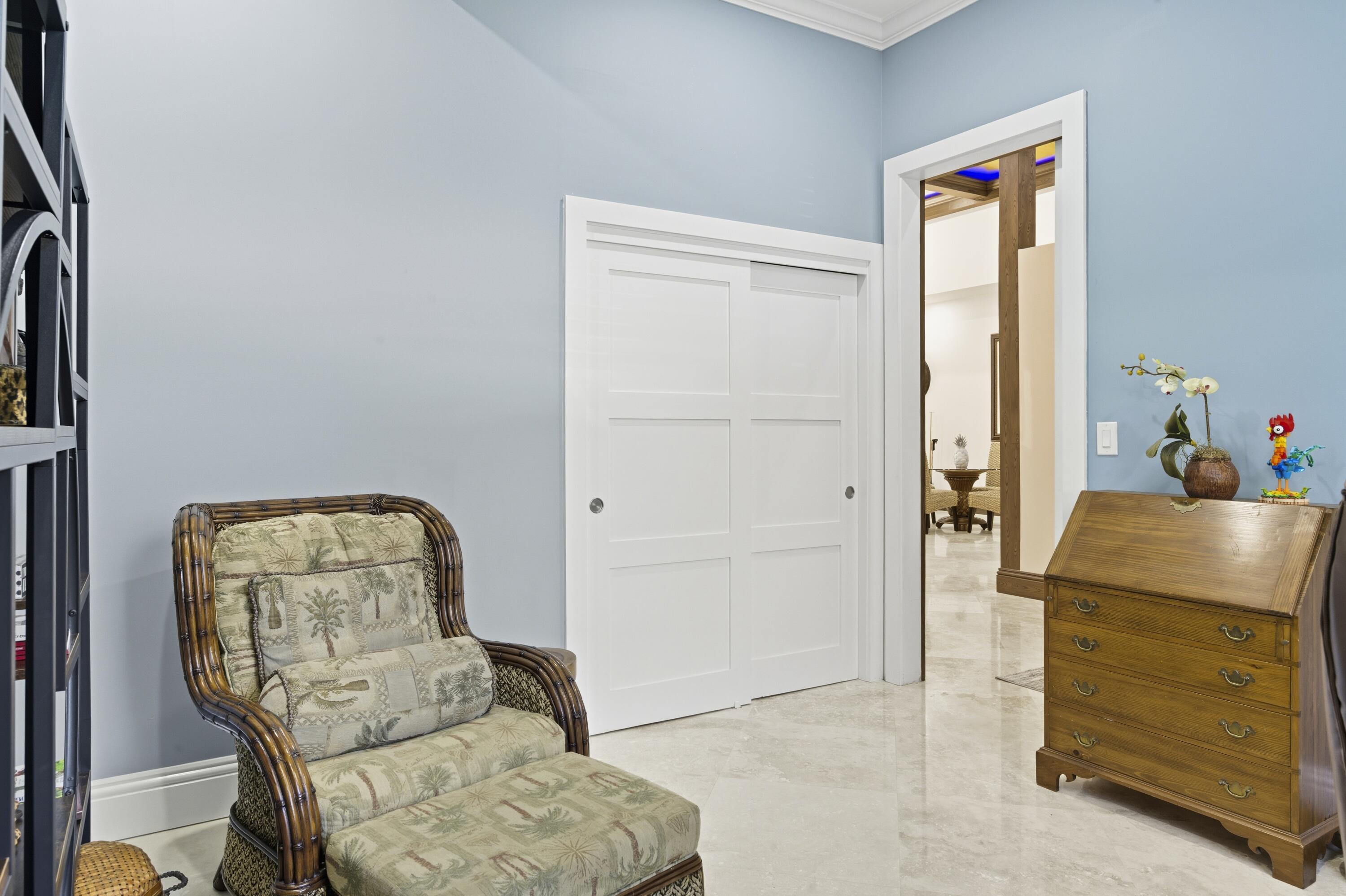 8350 Whispering Oak Way West Palm Beach, FL 33411 - Photo 41 of 51 a living room with furniture and a window