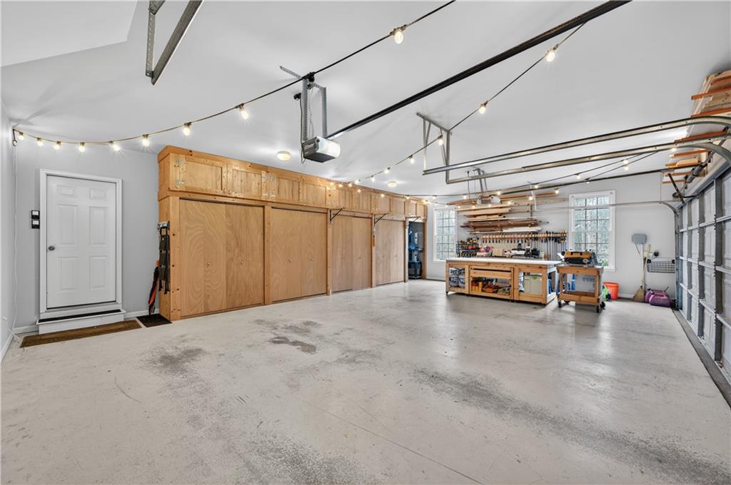 121 Laurel Ridge Drive Alpharetta, GA 30004 - Photo 11 of 14 a view of a garage with furniture