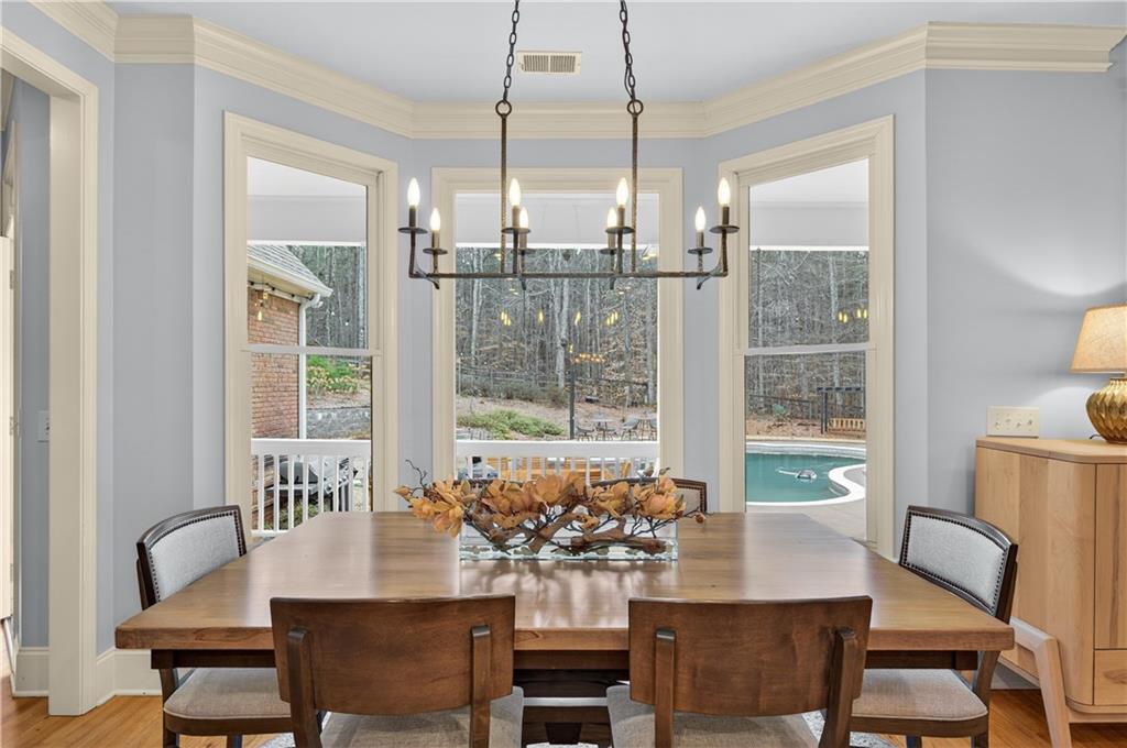 121 Laurel Ridge Drive Alpharetta, GA 30004 - Photo 5 of 14 a view of a dining room with furniture window and outside view