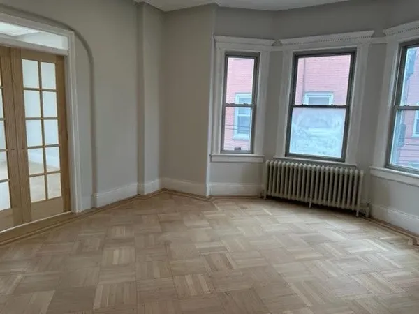 an empty room with windows
