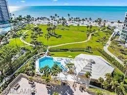 a view of a lake with a yard