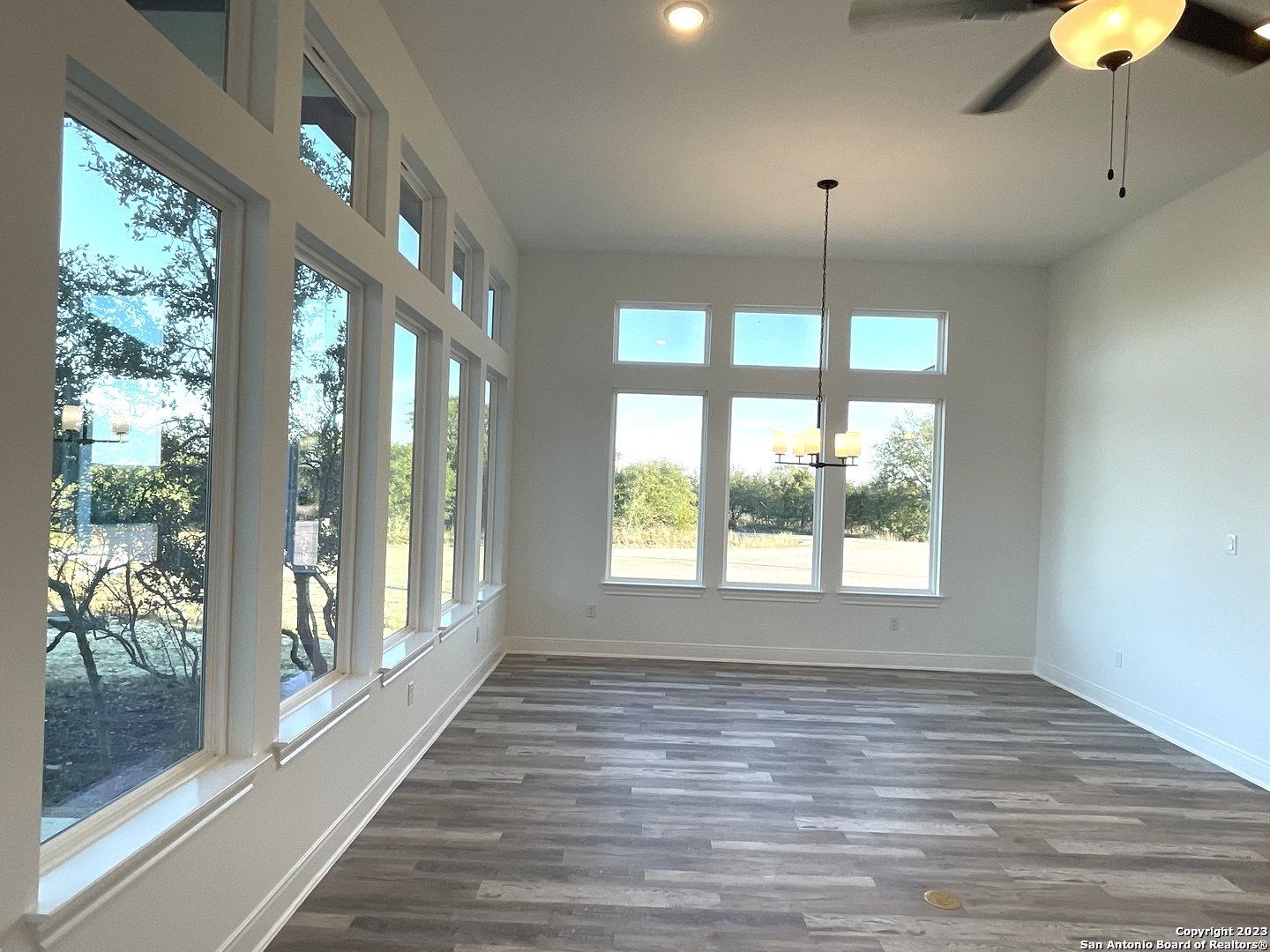 101 Daniel Jackson Blanco, TX 78606 - Photo 3 of 11 a bathroom with a large window and chandelier