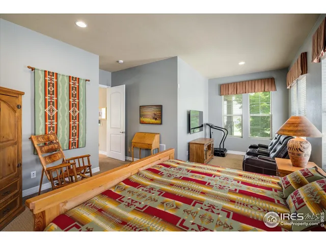 a bathroom with a granite countertop sink mirror and double