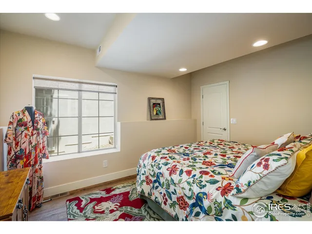 a bathroom with a sink a mirror and a shower