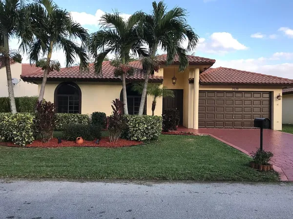 $585,000 | 7039 Golf Pointe Circle, Tamarac, FL 33321