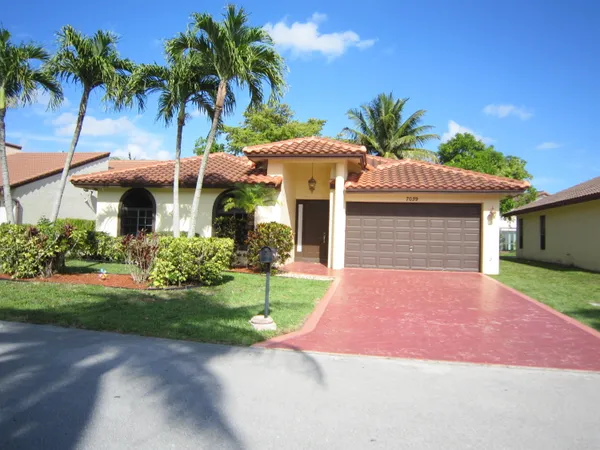 $585,000 | 7039 Golf Pointe Circle, Tamarac, FL 33321
