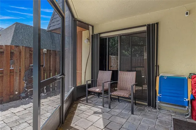 a balcony with view of outdoor space