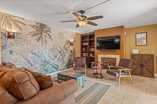 a kitchen room with granite countertop cabinets and stainless steel appliances