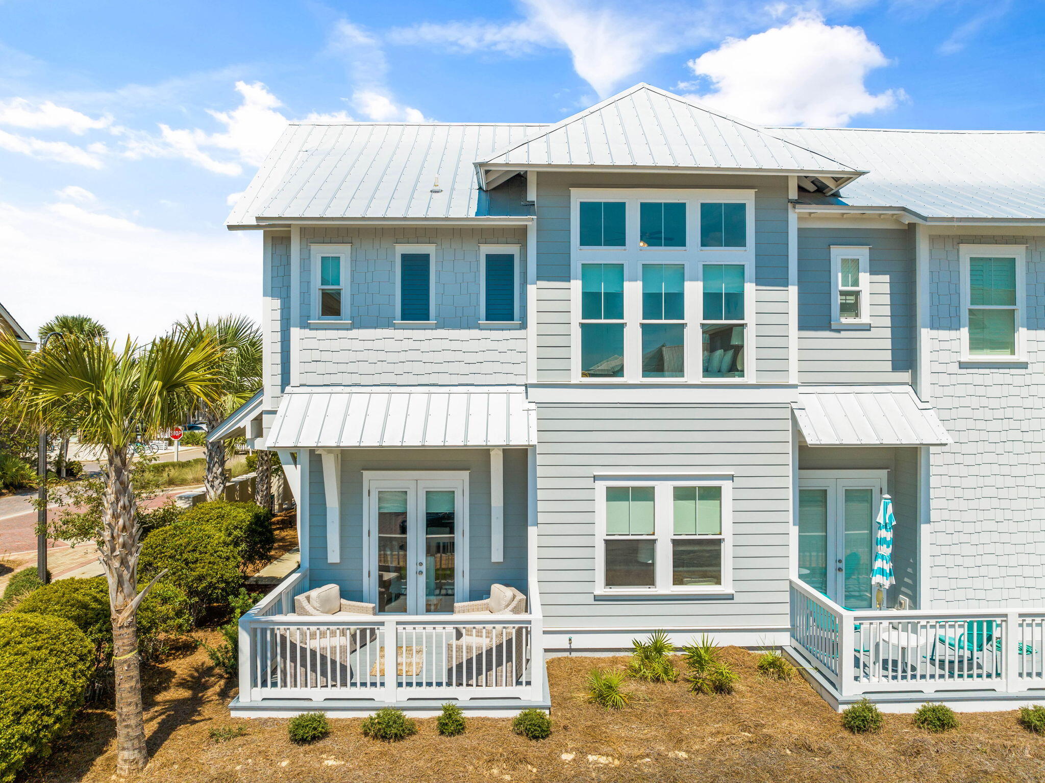 80 Wharf Ln Inlet Beach, Unit B Inlet Beach, FL 32461 - Photo 1 of 43 a front view of a house with garden
