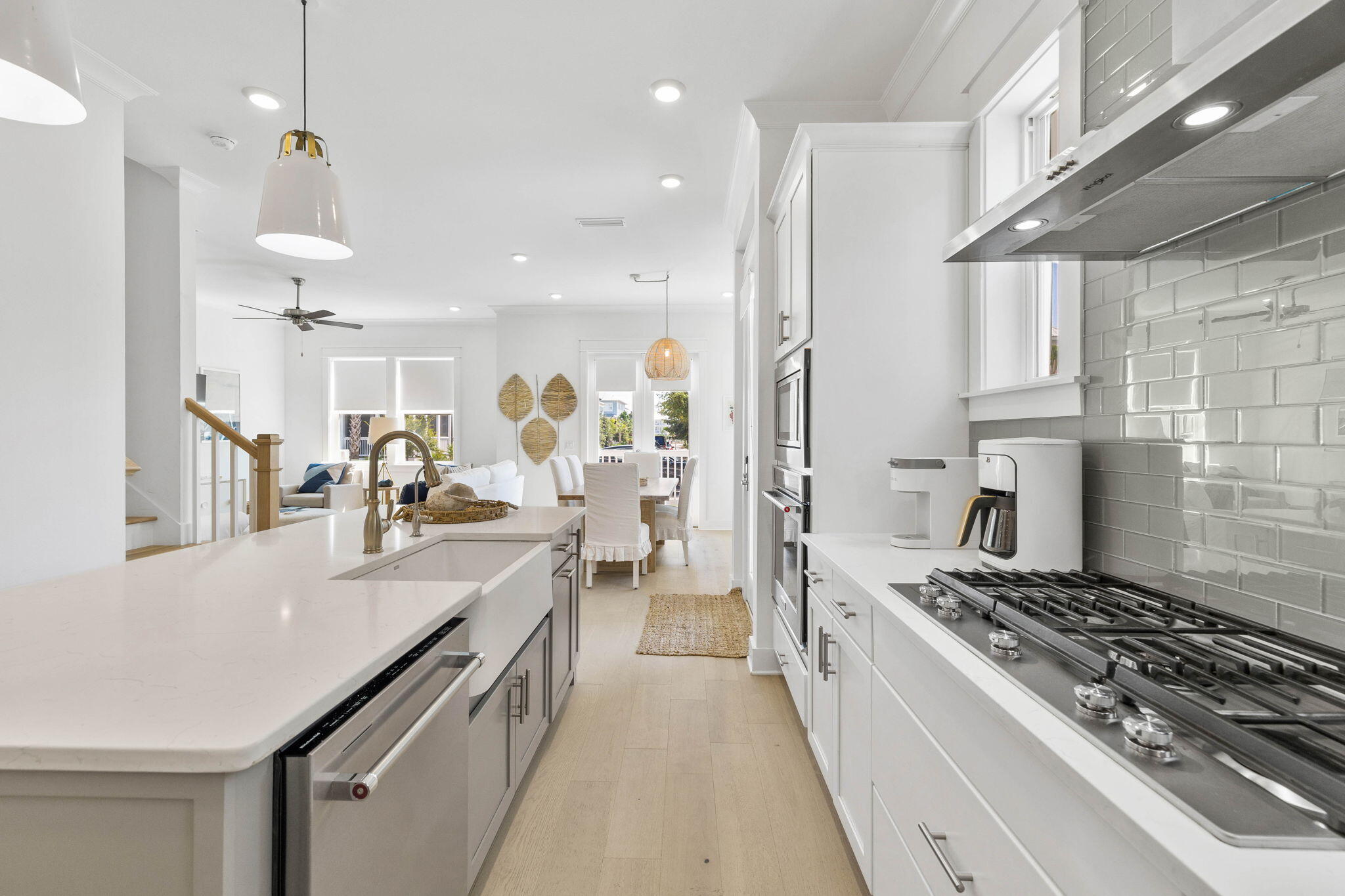 80 Wharf Ln Inlet Beach, Unit B Inlet Beach, FL 32461 - Photo 13 of 43 a kitchen with kitchen island granite countertop lots of counter top space a sink stainless steel appliances and cabinets