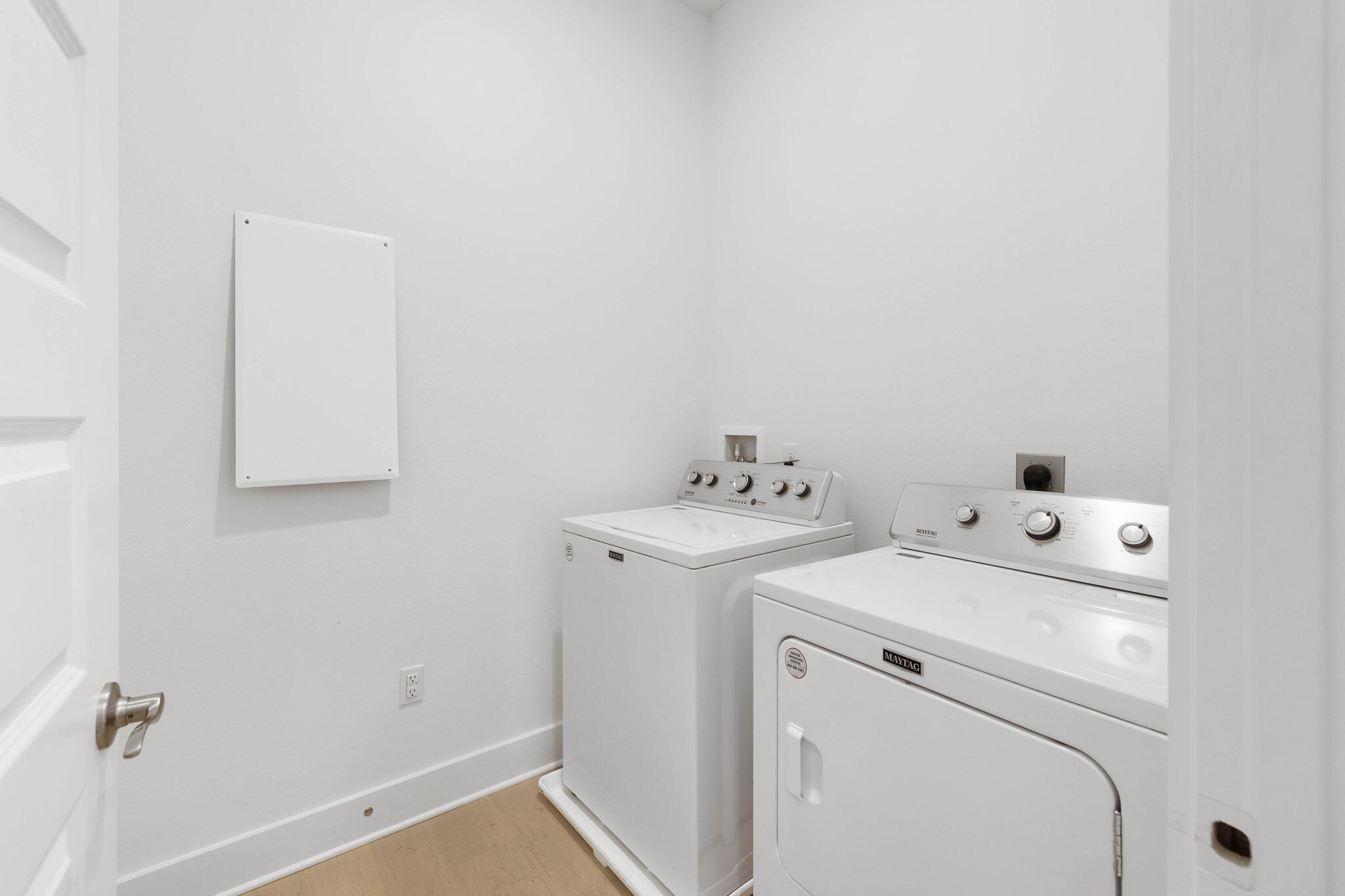80 Wharf Ln Inlet Beach, Unit B Inlet Beach, FL 32461 - Photo 23 of 43 a utility room with dryer and washer