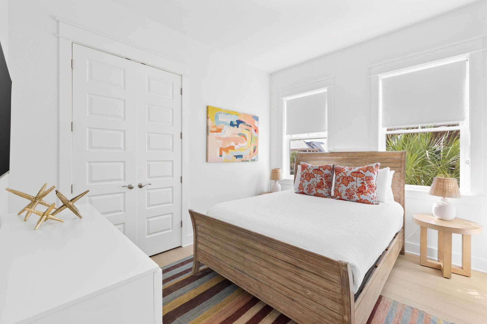 80 Wharf Ln Inlet Beach, Unit B Inlet Beach, FL 32461 - Photo 27 of 43 a bedroom with a bed and a table