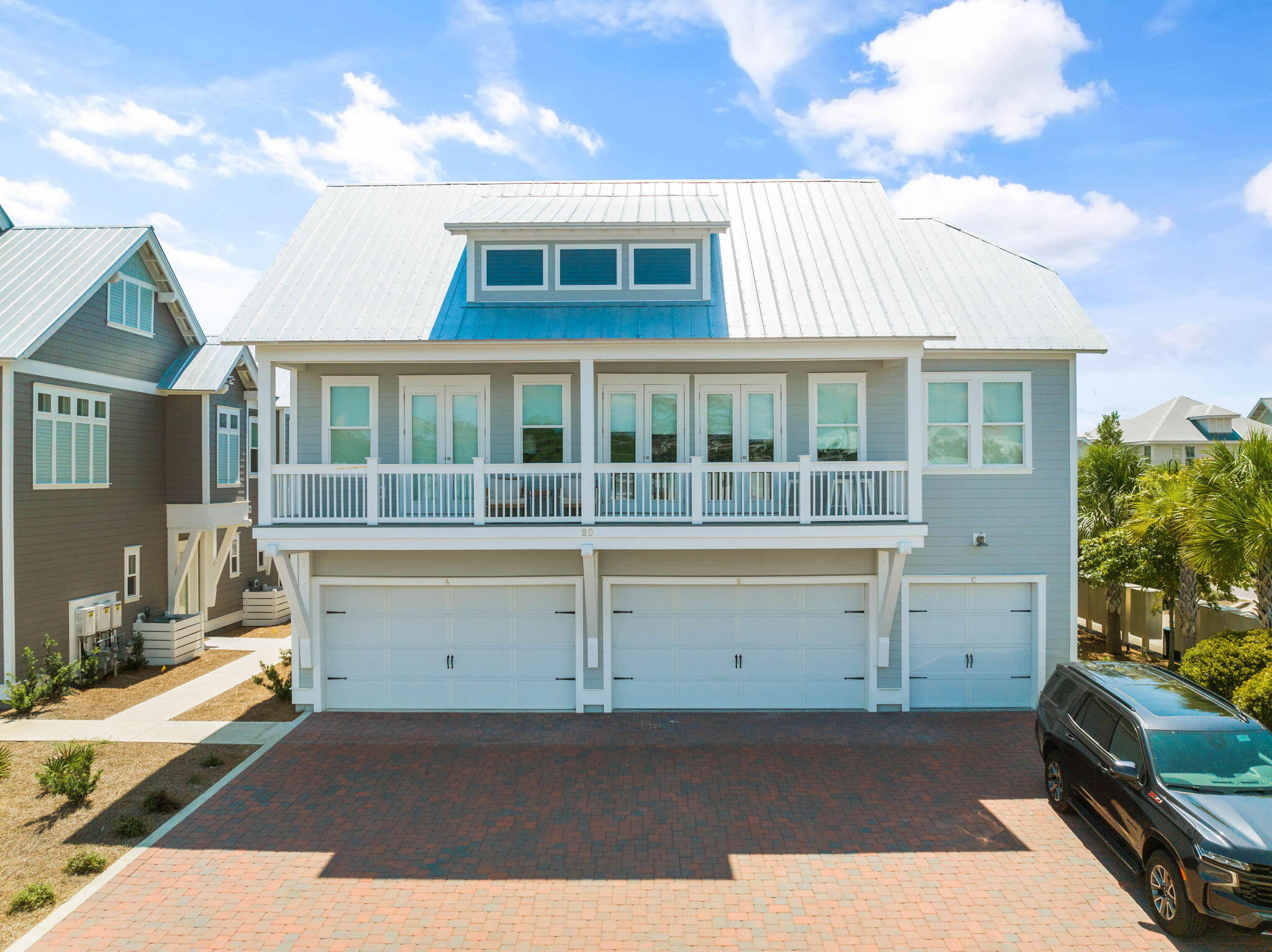 80 Wharf Ln Inlet Beach, Unit B Inlet Beach, FL 32461 - Photo 3 of 43 a front view of a house with a yard