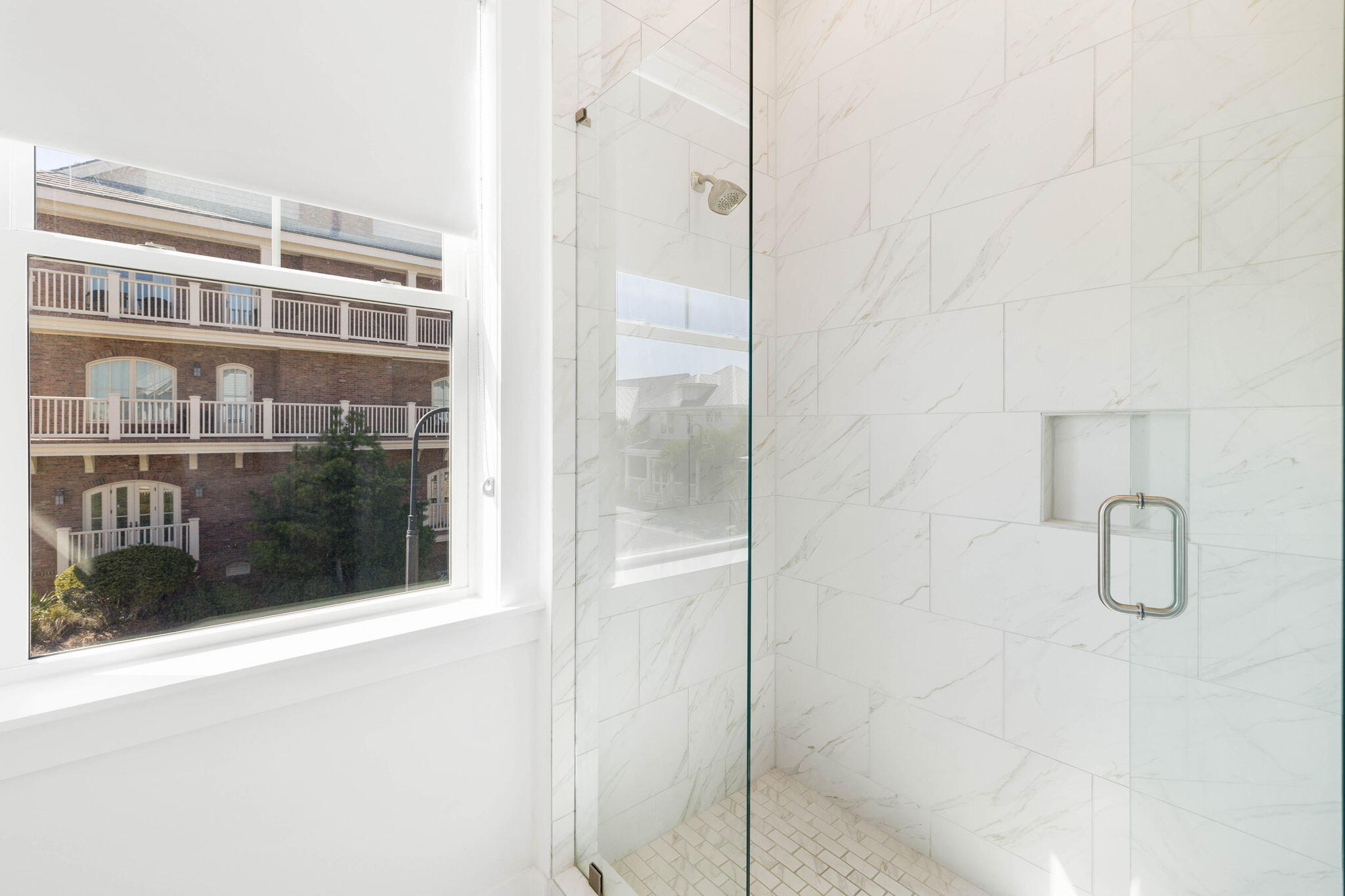 80 Wharf Ln Inlet Beach, Unit B Inlet Beach, FL 32461 - Photo 34 of 43 a bathroom with a glass shower door