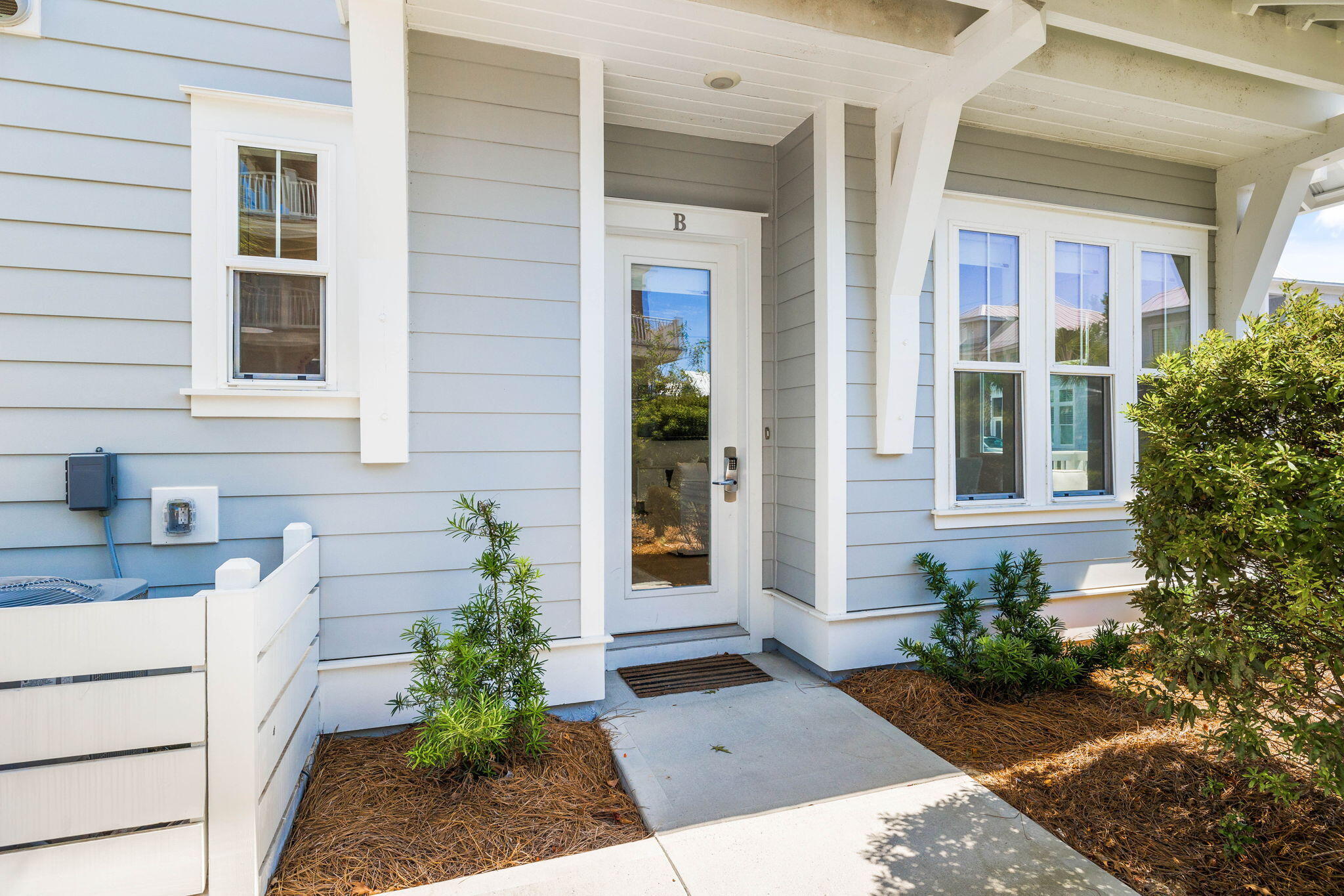 80 Wharf Ln Inlet Beach, Unit B Inlet Beach, FL 32461 - Photo 6 of 43 a view of a house with potted plants