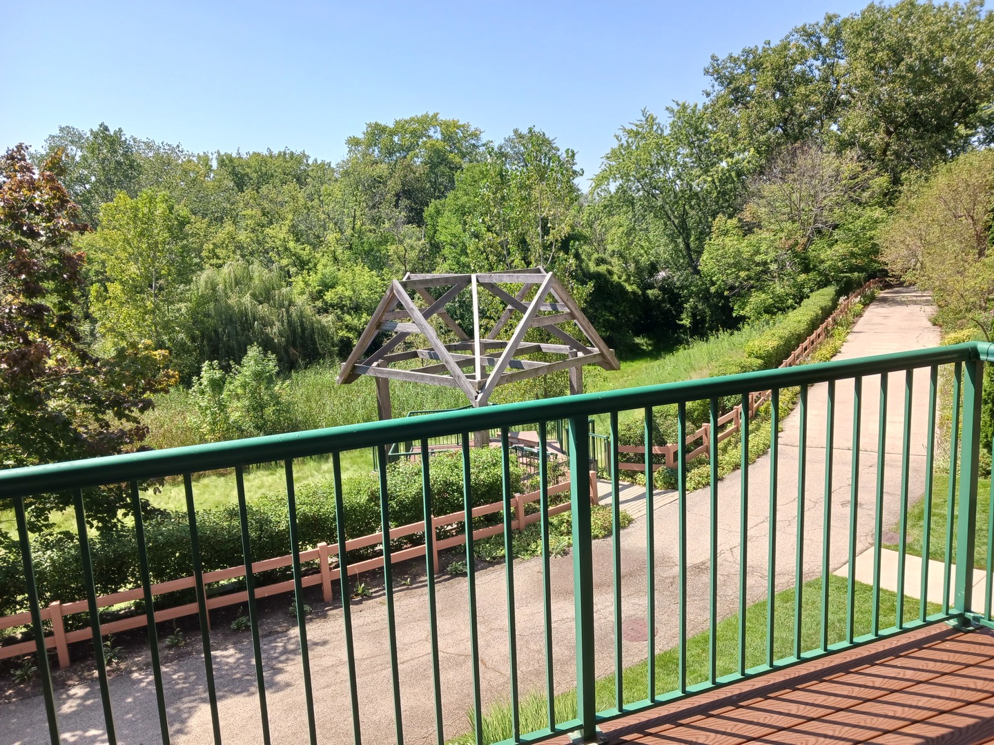 640 McHenry Road, Unit 208 Wheeling, IL 60090 - Photo 14 of 21 a view of a balcony with outdoor space