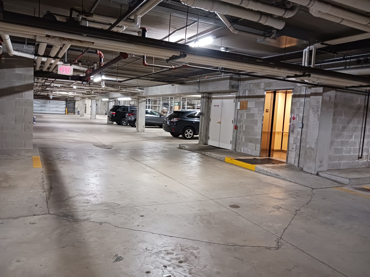 640 McHenry Road, Unit 208 Wheeling, IL 60090 - Photo 17 of 21 a view of parking garage