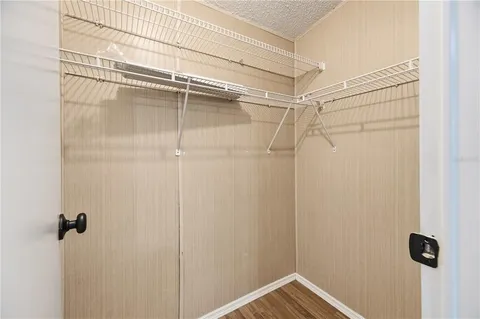 a bathroom with a double vanity sink toilet and shower