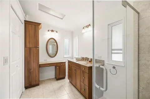 a bedroom with a bed and furniture