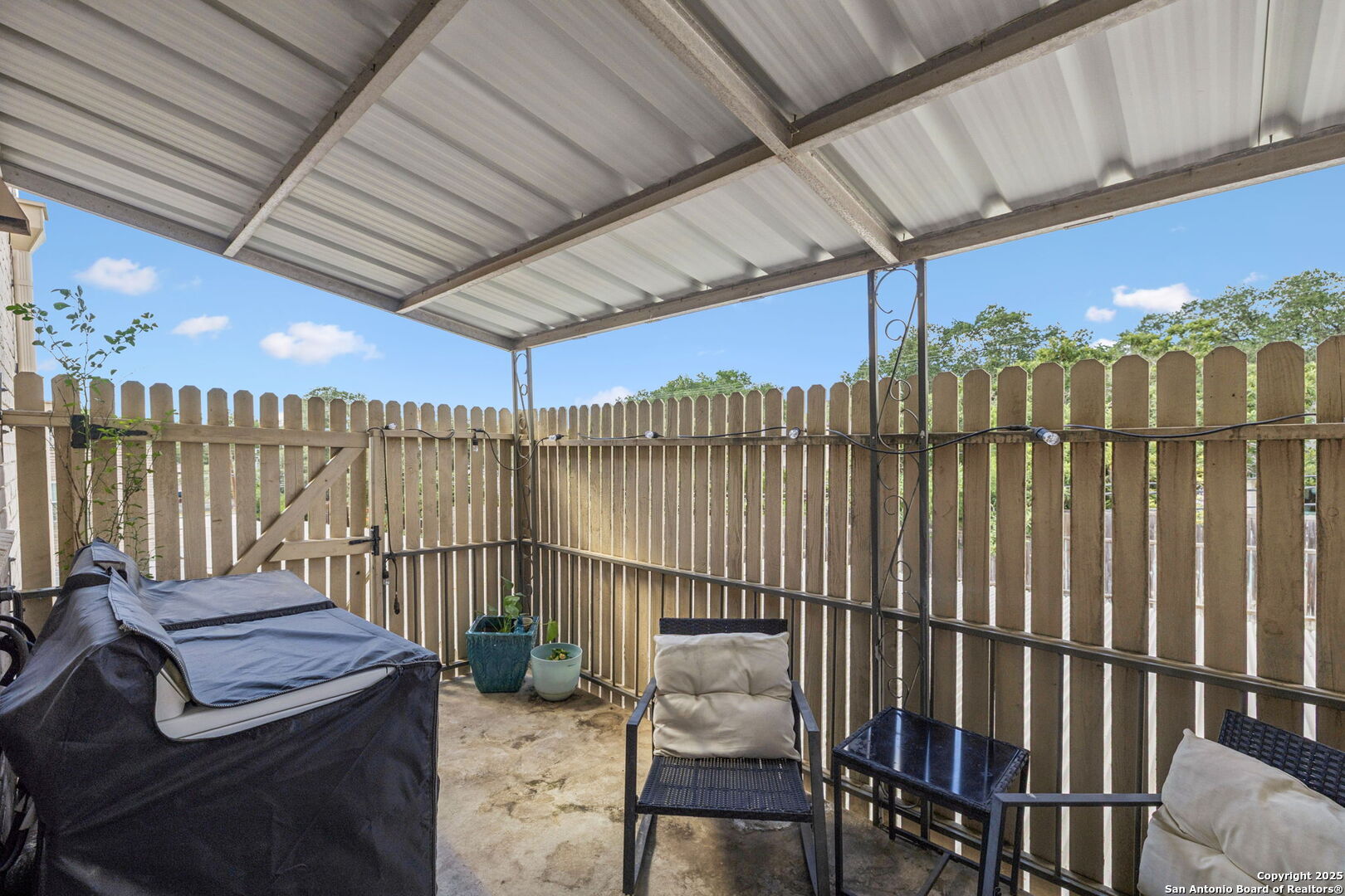 102 Ruelle Lane, Unit 220B San Antonio, TX 78209 - Photo 37 of 37 a view of a balcony with furniture