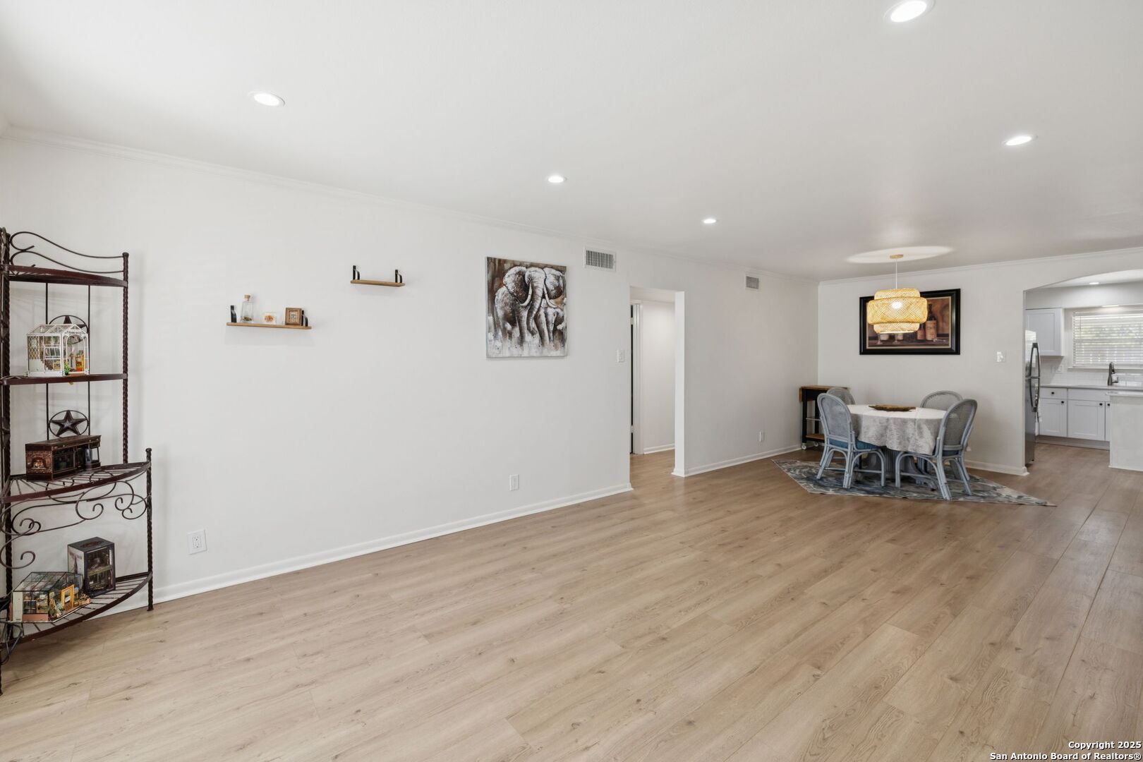102 Ruelle Lane, Unit 220B San Antonio, TX 78209 - Photo 5 of 37 a view of work space with furniture and wooden floor